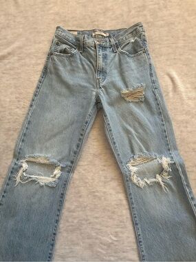 Levi’s ripped flare jeans